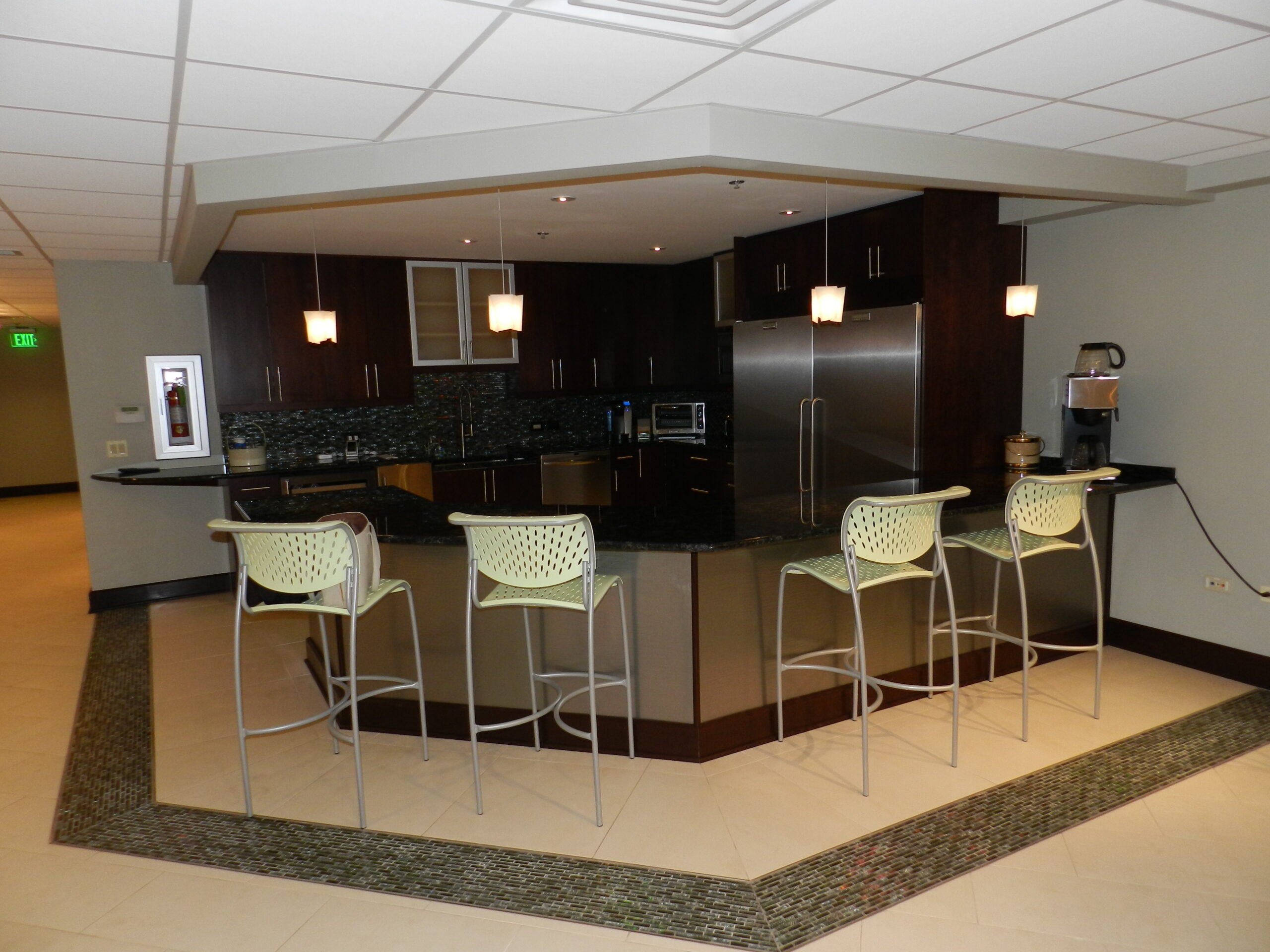 kitchen area with bar | GMD Surfaces in Chicagoland and Northwest Indiana