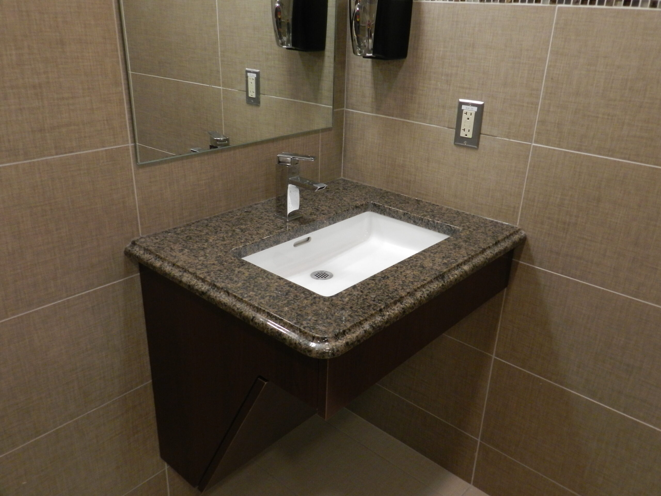 bathroom countertop in commercial space | GMD Surfaces in Chicagoland and Northwest Indiana