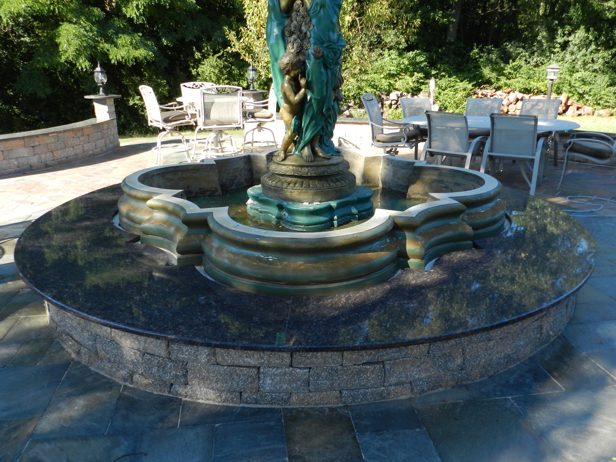 surface around fountain on a patio | GMD Surfaces in Chicagoland and Northwest Indiana